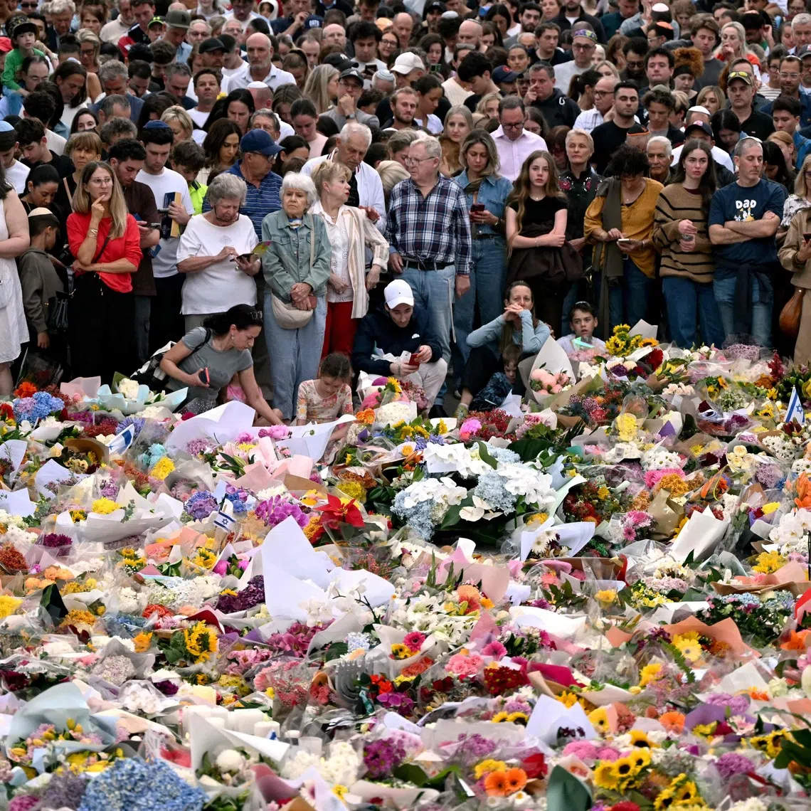 Mourners gathering at the Bondi Pavilion on Dec 16 for a tribute in memory of the victims of the Dec 14 Bondi Beach shooting.