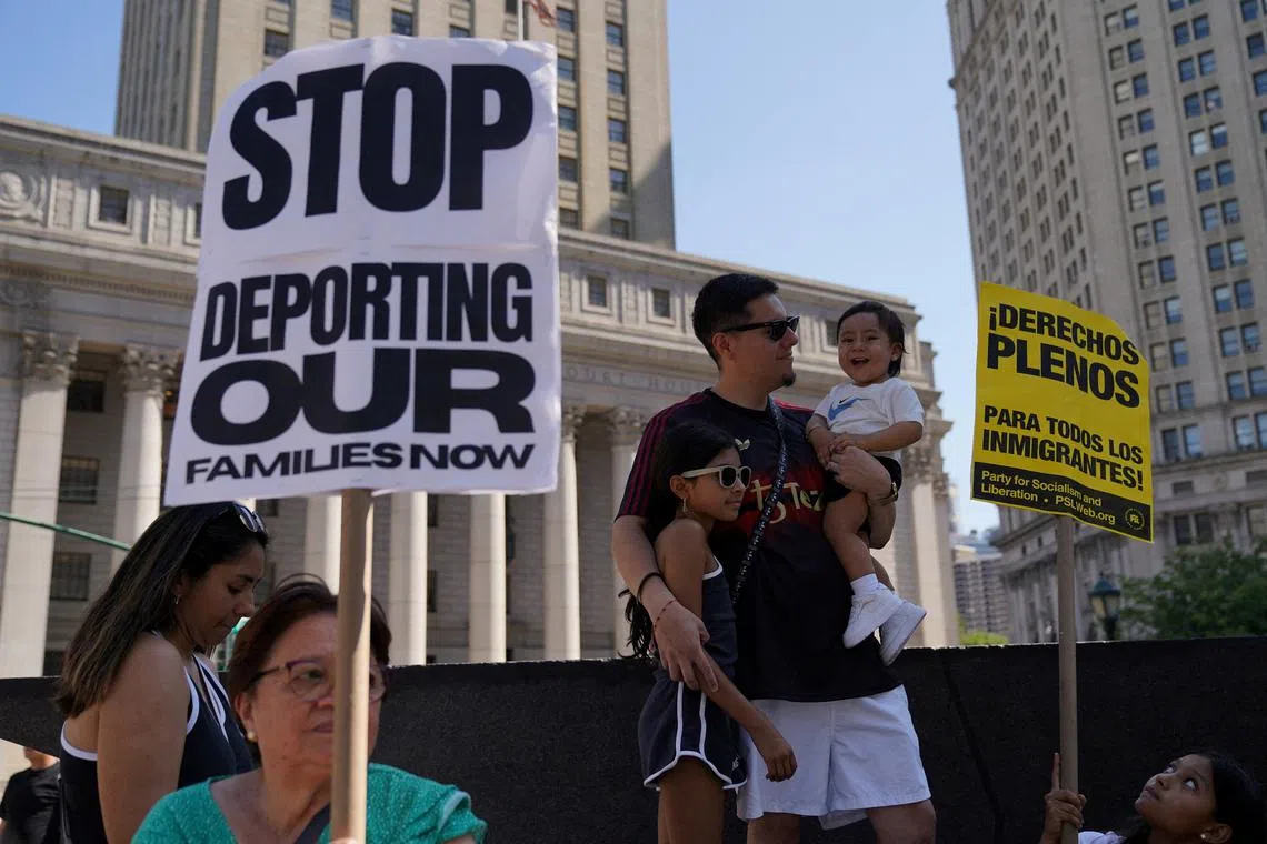 FILE PHOTO: Protesters gather at Foley Square during an \"ICE Out of New York: Stop the Deportation\" rally in New York City, U.S., August 9, 2025. REUTERS/Ryan Murphy/File Photo