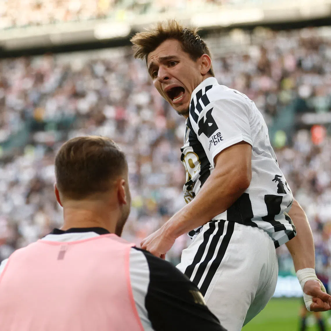 Juventus’ Francisco Conceicao celebrates scoring their first goal.