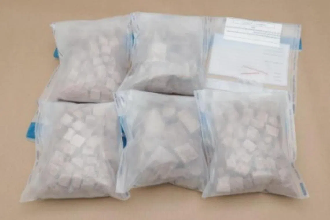 Heroin seized from a Singapore-registered car at Woodlands Checkpoint on Aug 13.