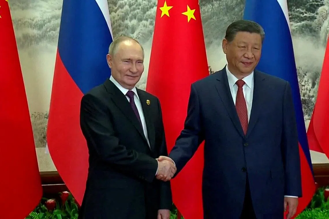 Mr Xi (right) pledged to work with Mr Putin to “rejuvenate” their countries as the pair started a day of talks in Beijing, saying China would “always be a good partner” of Russia.