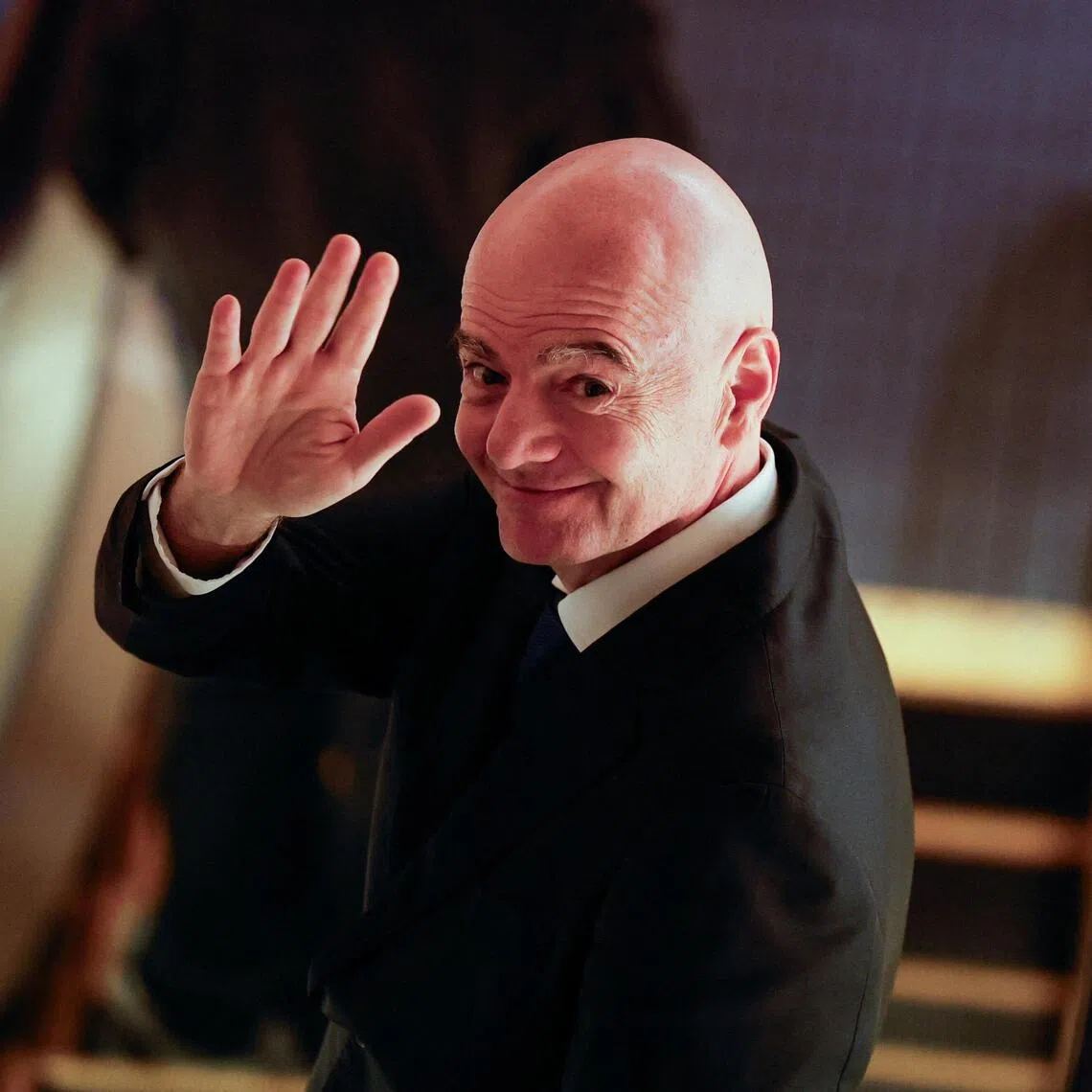 FIFA president Gianni Infantino gesturing to reporters as he heads to the Asian Football Confederation’s extraordinary congress in Tokyo, Japan, on Oct 23.