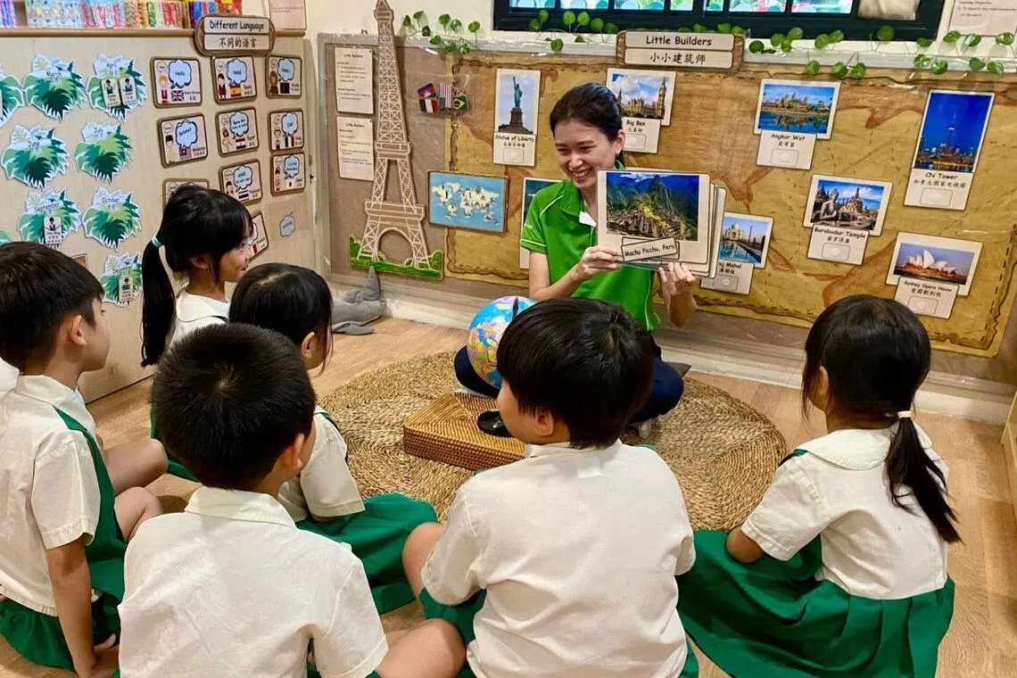 kinderland-teacher-sherilyn-ha-with-students