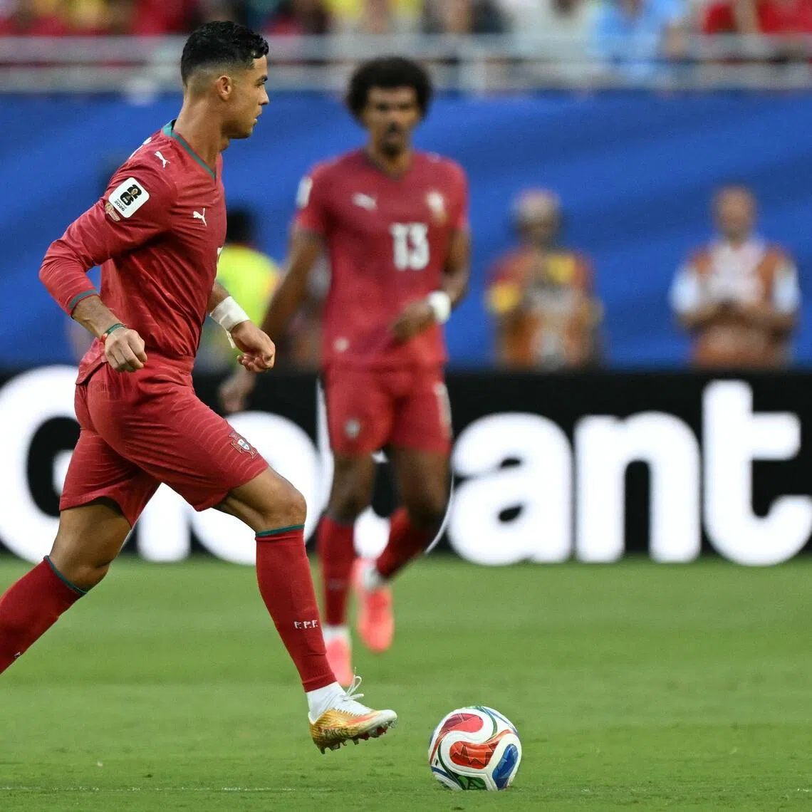 Portugal's forward #07 Cristiano Ronaldo runs with the ball during the 2026 World Cup Group K football match between Colombia and Portugal at the Miami Stadium in Miami Gardens on June 27, 2026.  (Photo by CHANDAN KHANNA / AFP)