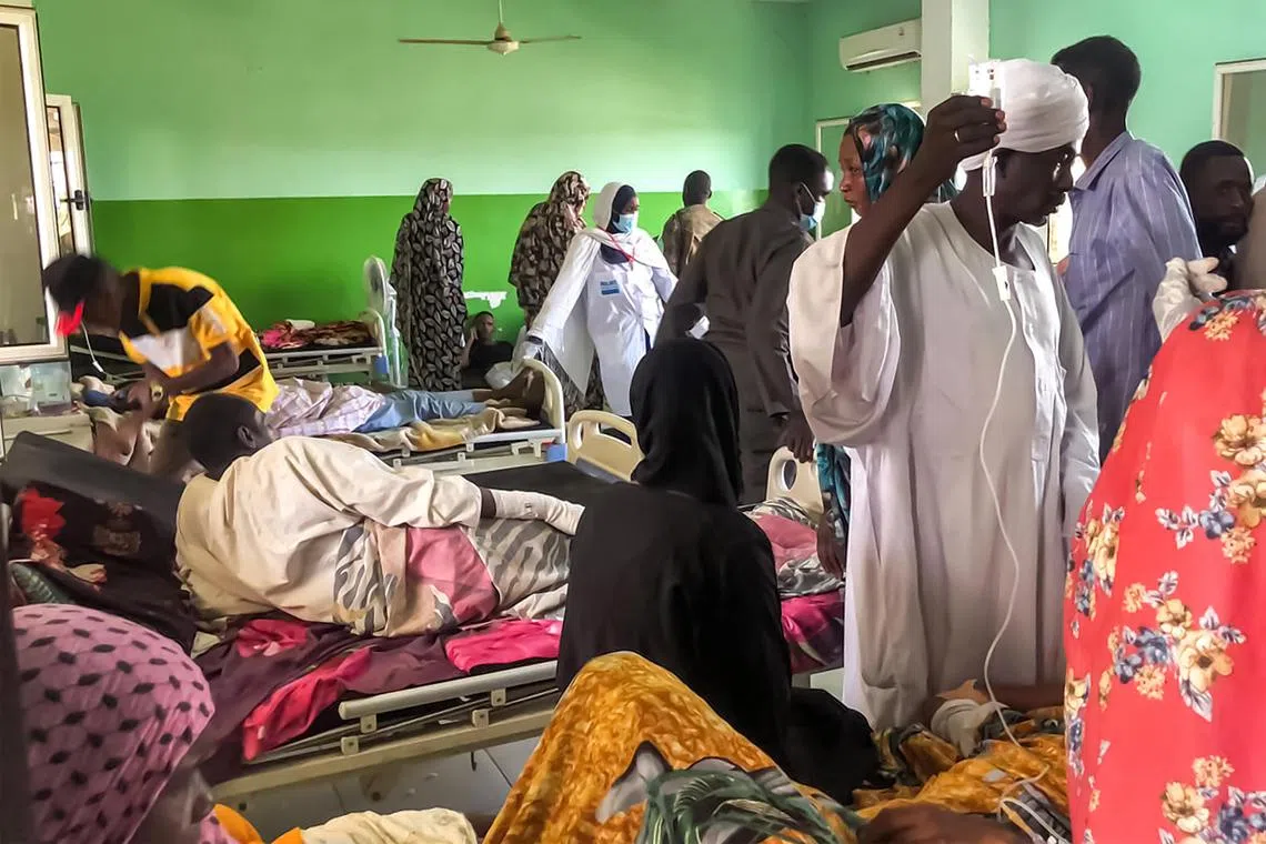 A crowded ward at a hospital in El Fasher in Sudan's North Darfur region, where multiple people have been wounded in ongoing battles there.