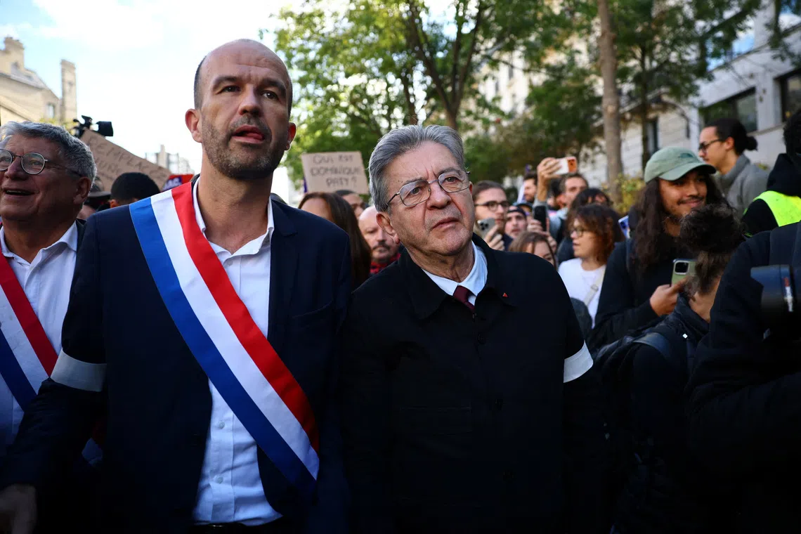 Image 4: Jean-Luc Melenchon, leader of French far-left opposition party La France Insoumise (France Unbowed - LFI) and candidate for the 2027 French presidential election and LFI member of parliament Manuel Bompard attend a demonstration by French high school and university students in Paris as part of a nationwide protest movement led by students, supported by teachers, school parents and labour unions, demanding better school conditions and concrete measures, France, October 13, 2026.   REUTERS/Sarah Meyssonnier