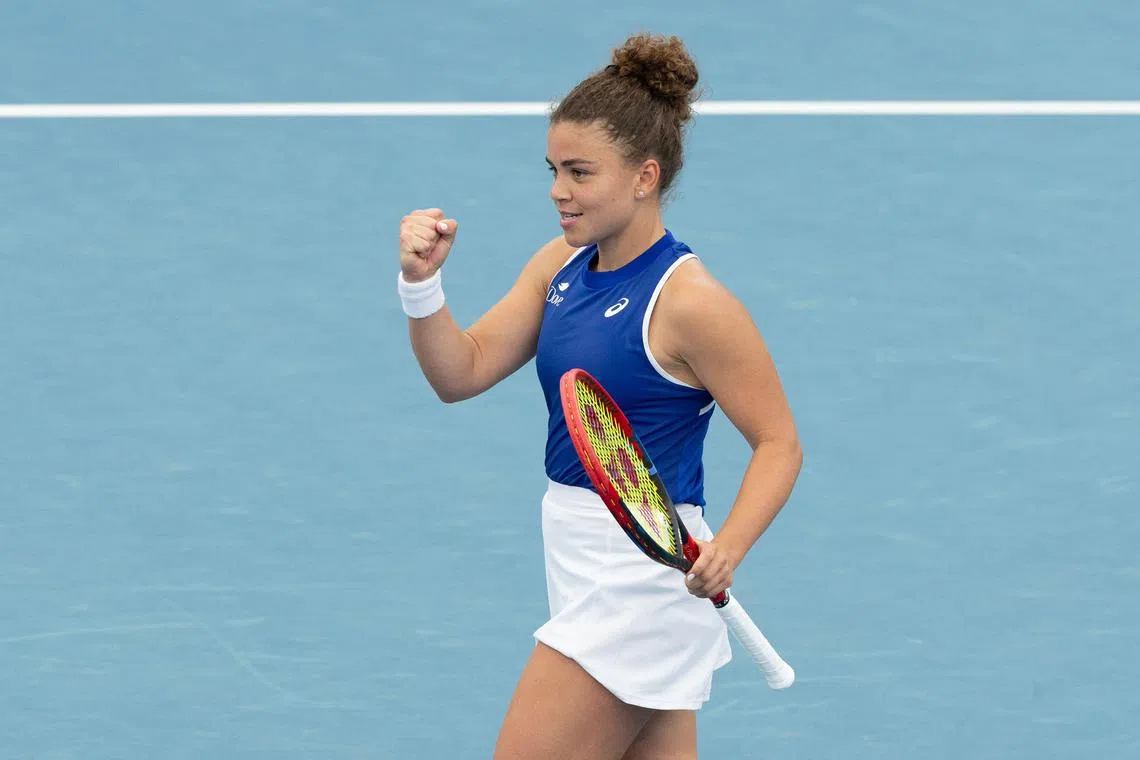 Italy’s Jasmine Paolini celebrating her 6-0, 6-2 victory against France’s Chloe Paquet during their women’s singles match at the United Cup tennis tournament on Ken Rosewall Arena in Sydney on Dec 31.