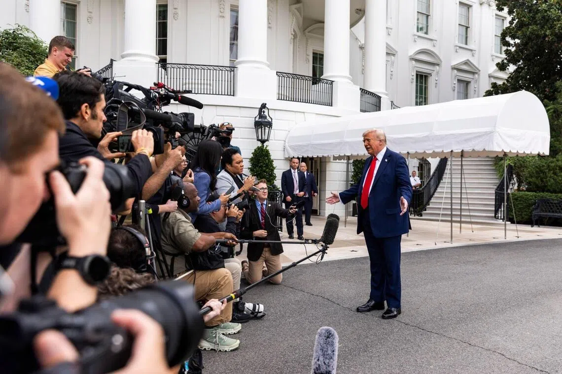 US President Donald Trump speaks to members of the media at the White House on Sept 21.