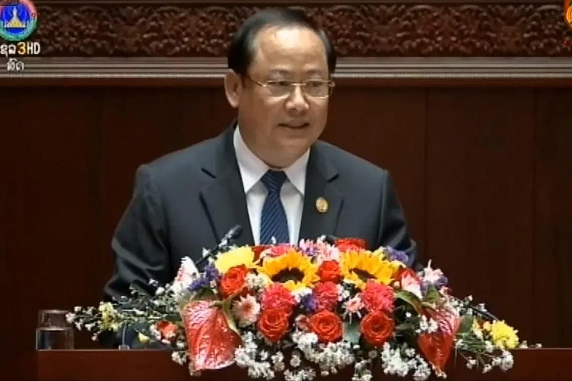 This handout screengrab taken from Laos state broadcaster Lao TV on Dec 30, 2022 shows new Laos Prime Minister Sonexay Siphandone addressing the national assembly in the capital Vientiane.