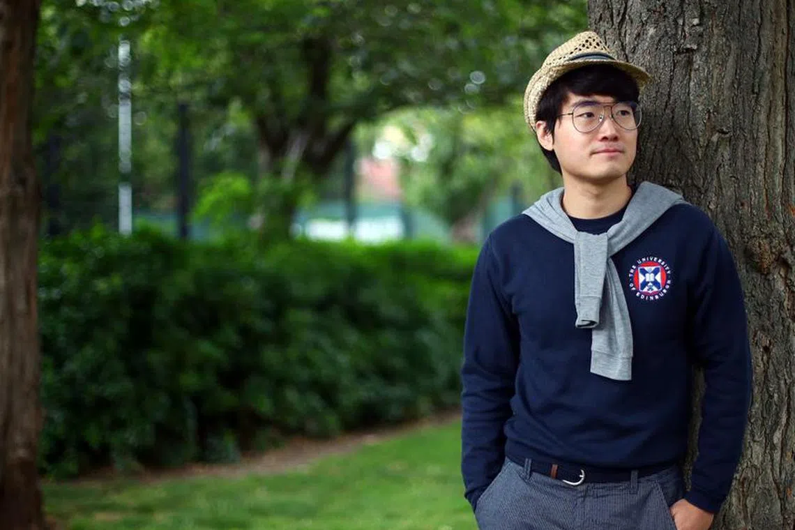 FILE PHOTO: Simon Cheng, a former British Consulate employee, poses for a photograph in London, Britain, July 2, 2020. REUTERS/Hannah McKay/File Photo