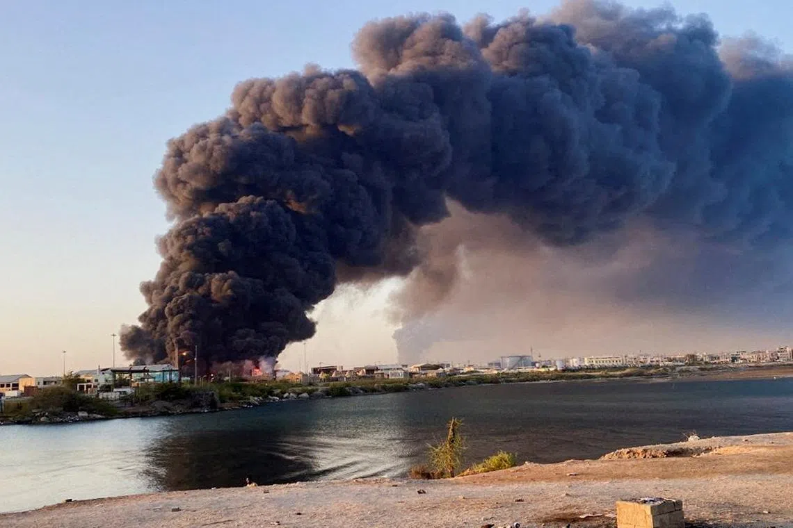 A large plume of smoke and fire rising from fuel depot in Port Sudan, Sudan, on May 6, 2025. 