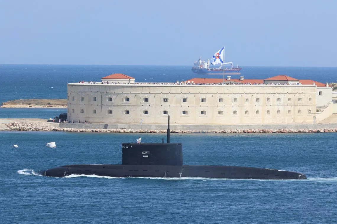 FILE PHOTO: The Russian Navy's improved kilo-class submarine Kolpino sails during the Navy Day parade in the Black Sea port of Sevastopol, Crimea July 26, 2020. REUTERS/Alexey Pavlishak/File Photo