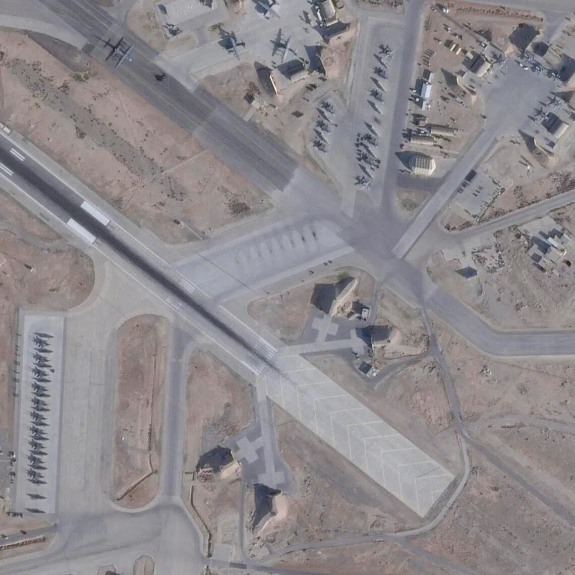 In a satellite image from Planet Labs, aircraft are seen at the Muwaffaq Salti Air Base in Azraq, Jordan, on Feb 2.