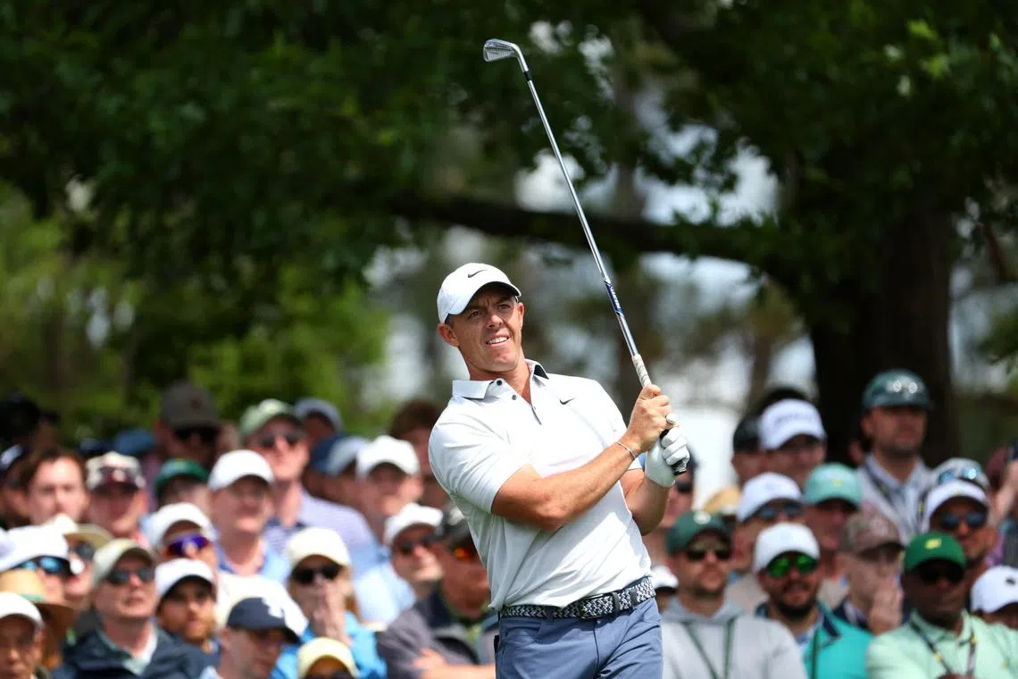 Golf - The Masters - Augusta National Golf Club, Augusta, Georgia, U.S. - April 12, 2025 Northern Ireland's Rory McIlroy watches his tee shot on the 4th hole during the third round REUTERS/Mike Segar