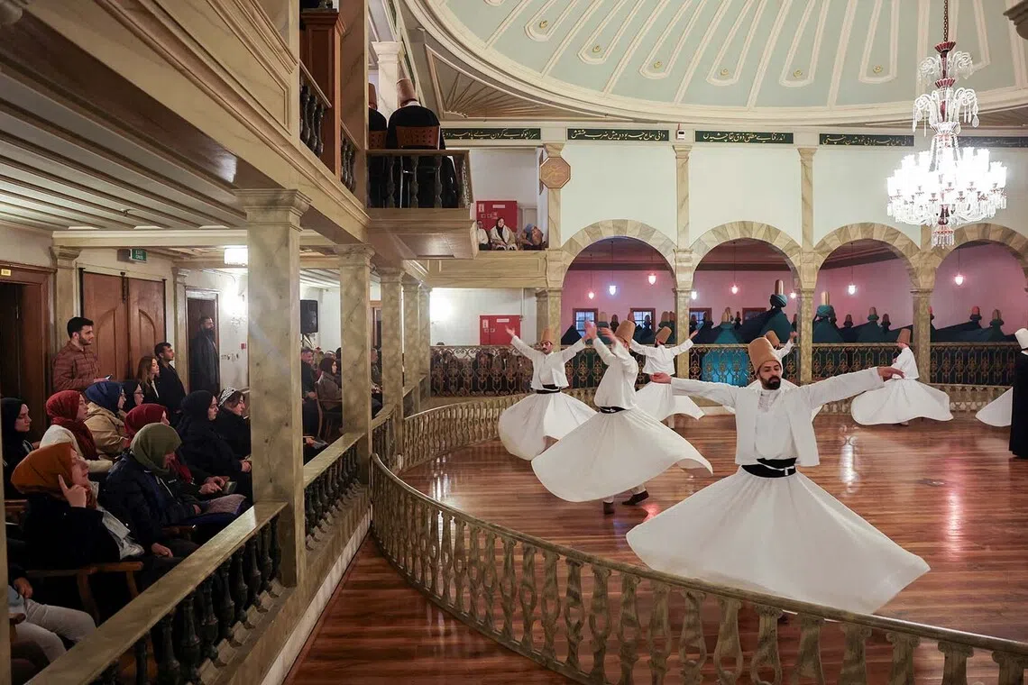 Whirling dervishes performing a Sema ritual during a ceremony, one of many marking the 752nd anniversary of the death of Mevlana Jalaluddin Rumi, an Anatolian philosopher, poet and the father of the Mevlevi order, at Yenikapi Mevlevi Temple in Istanbul, Turkey, Dec 9, 2025. 