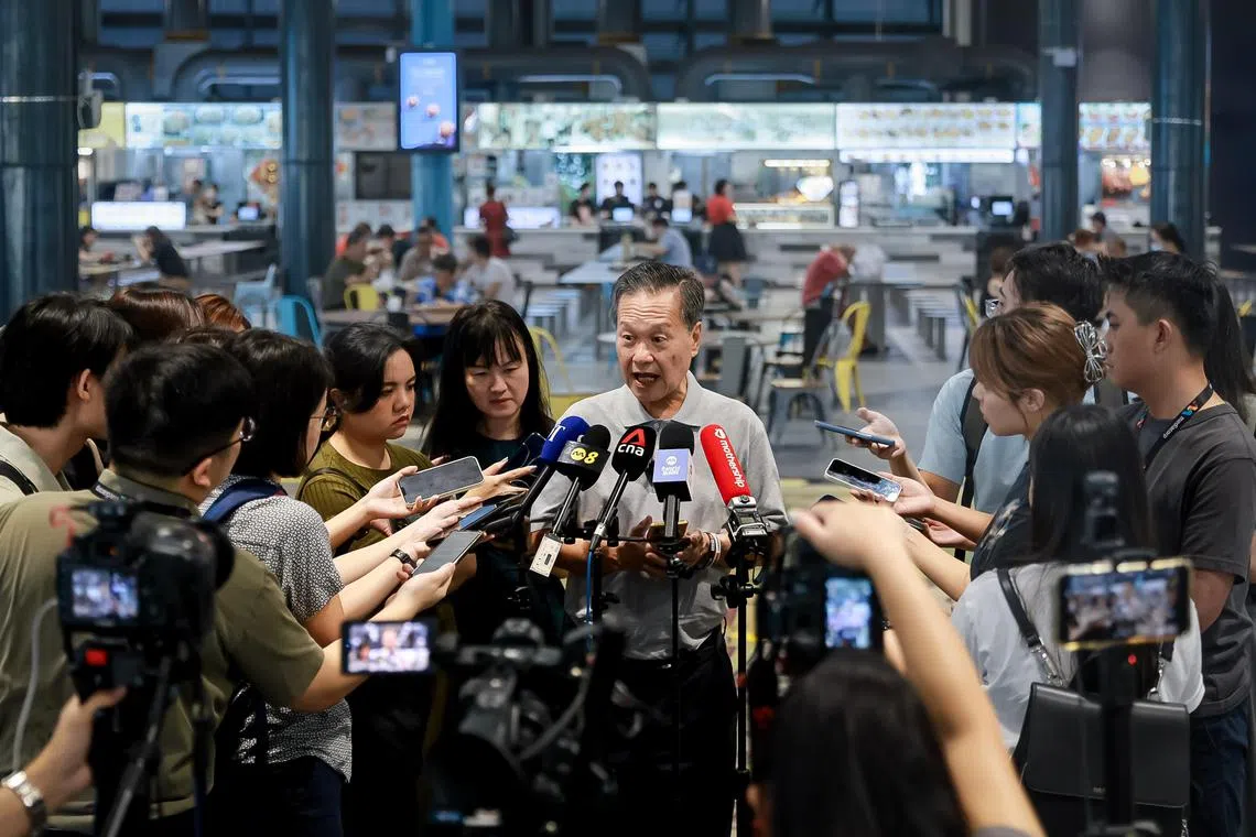 Presidential candidate Tan Kin Lian speaking to the media during his visit to Senja Hawker Centre, Aug 24, 2023.