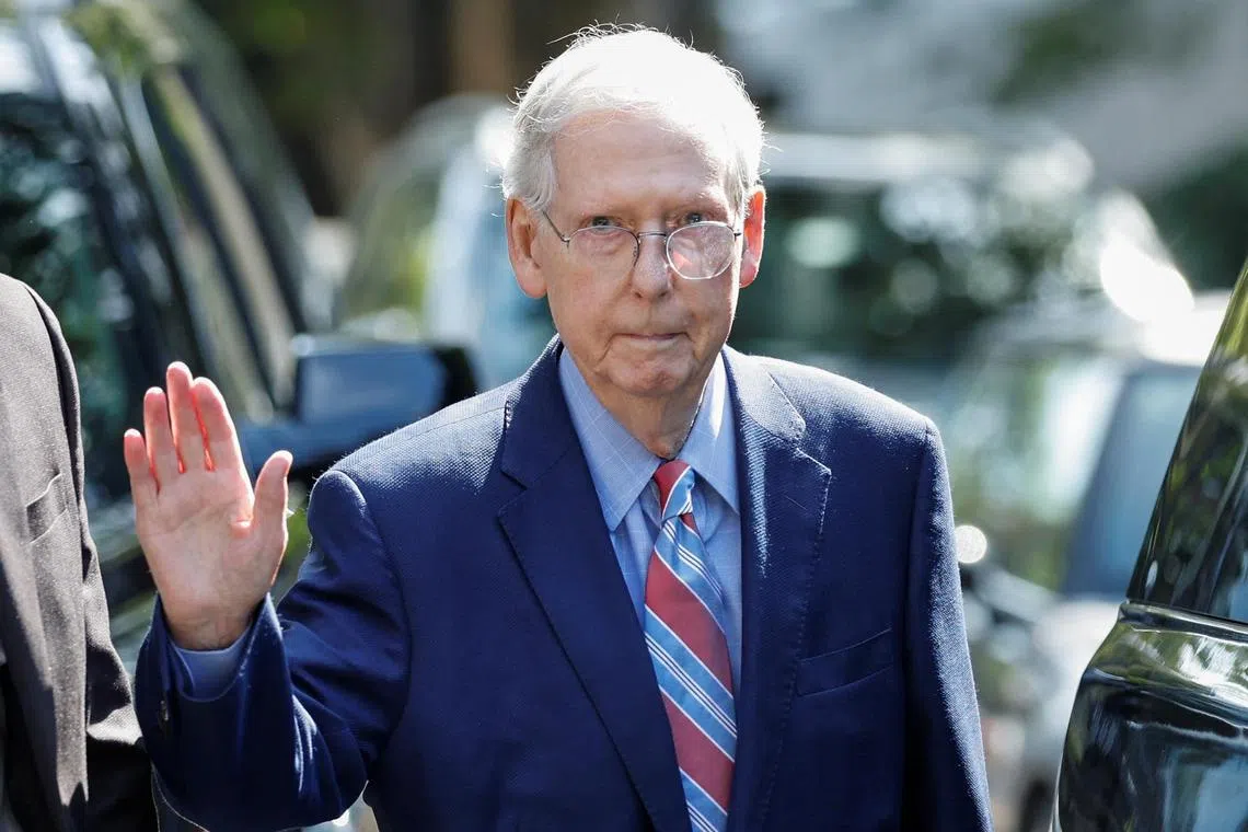 US Senate Minority Leader Mitch McConnell leaves his Washington house to return to work at the US Senate, less than a week after freezing up for a second time in a press briefing.