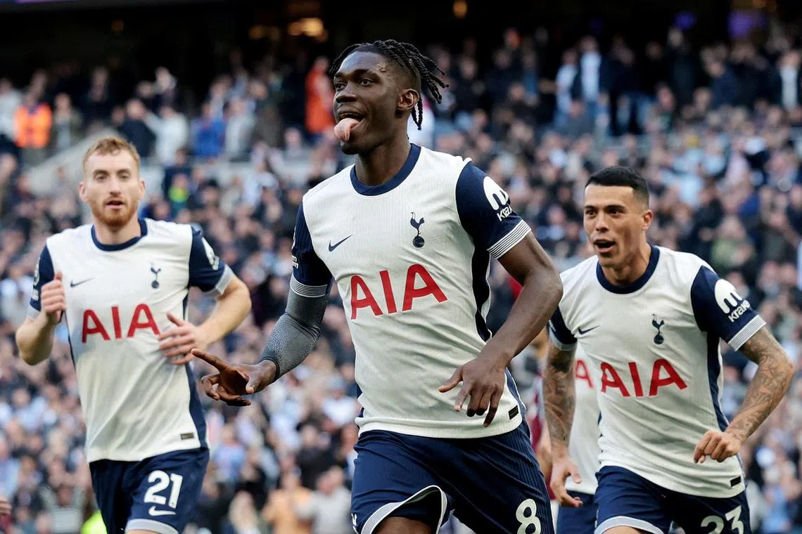 Tottenham Hotspur's Yves Bissouma (centre) celebrating scoring their second goal in a 4-1 home win over West Ham United with Pedro Porro (right) and Dejan Kulusevski at the Tottenham Hotspur Stadium on Oct 19. That goal helped spark a second half turnaround in the English Premier League match.