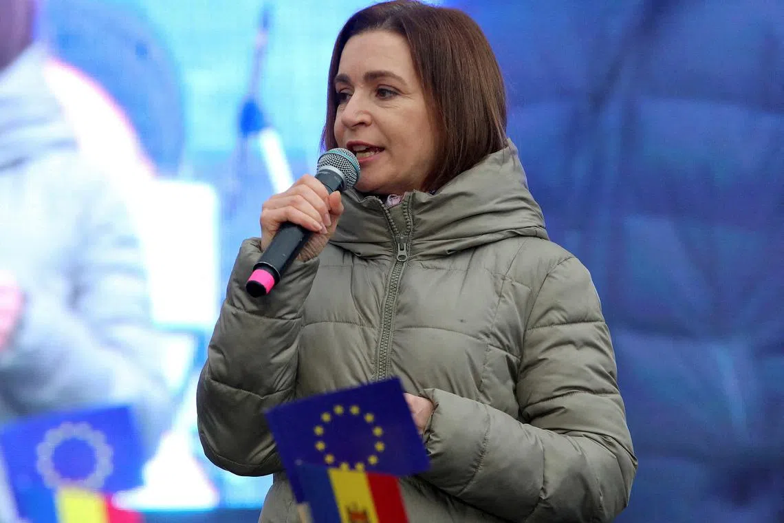 FILE PHOTO: Moldovan President Maia Sandu addresses participants of a rally and concert, who celebrate the European Union's decision to open membership talks with Moldova, in Chisinau, Moldova, December 17, 2023. REUTERS/Vladislav Culiomza/File Photo