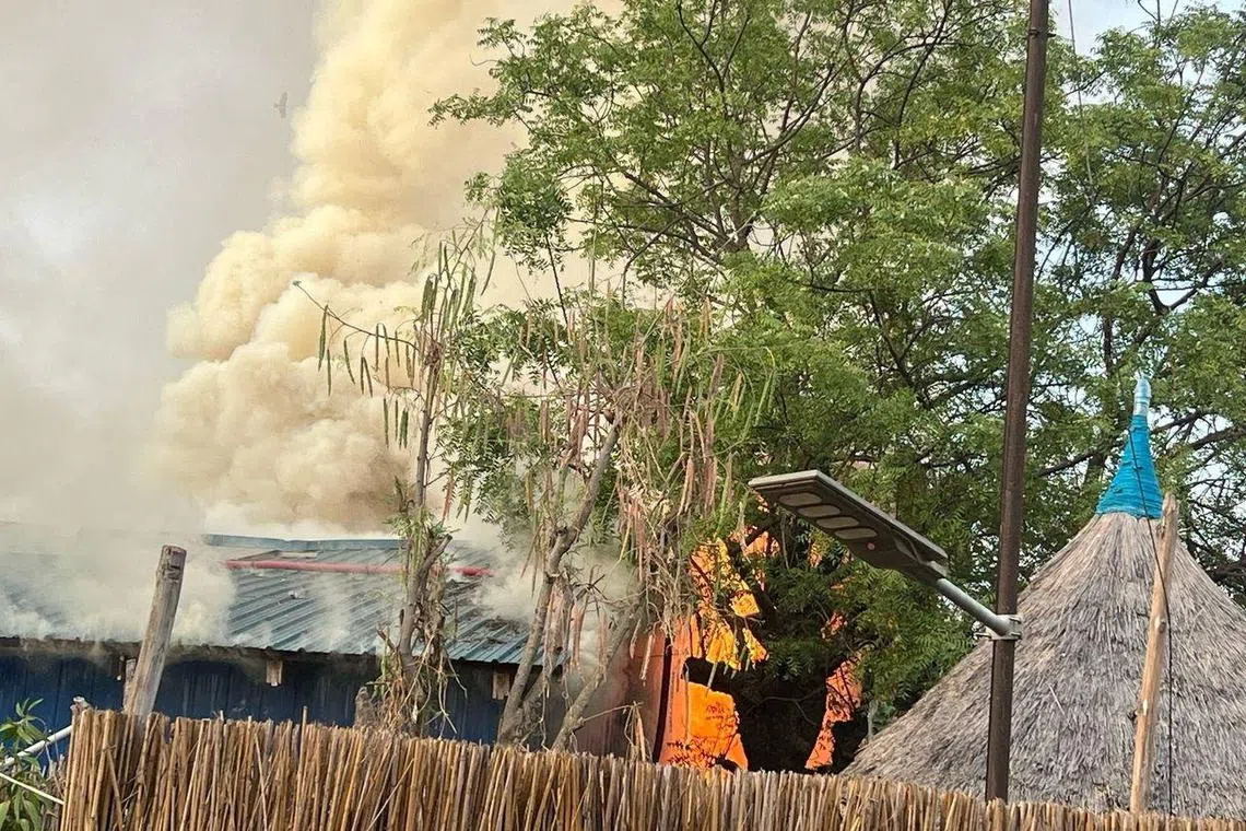 A fire burns following an aerial bombardment that resulted in casualties at the medical charity Medecins Sans Frontieres run facility destroying the last remaining hospital and pharmacy in the northern town of Old Fangak in Fangak county, South Sudan May 3, 2025. Medecins Sans Frontieres/Handout via REUTERS