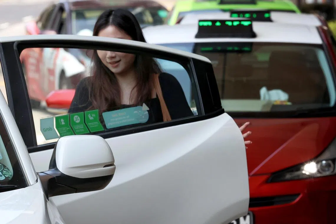 Grab vehicles, PHV private hire cars and Transcab generic photos.