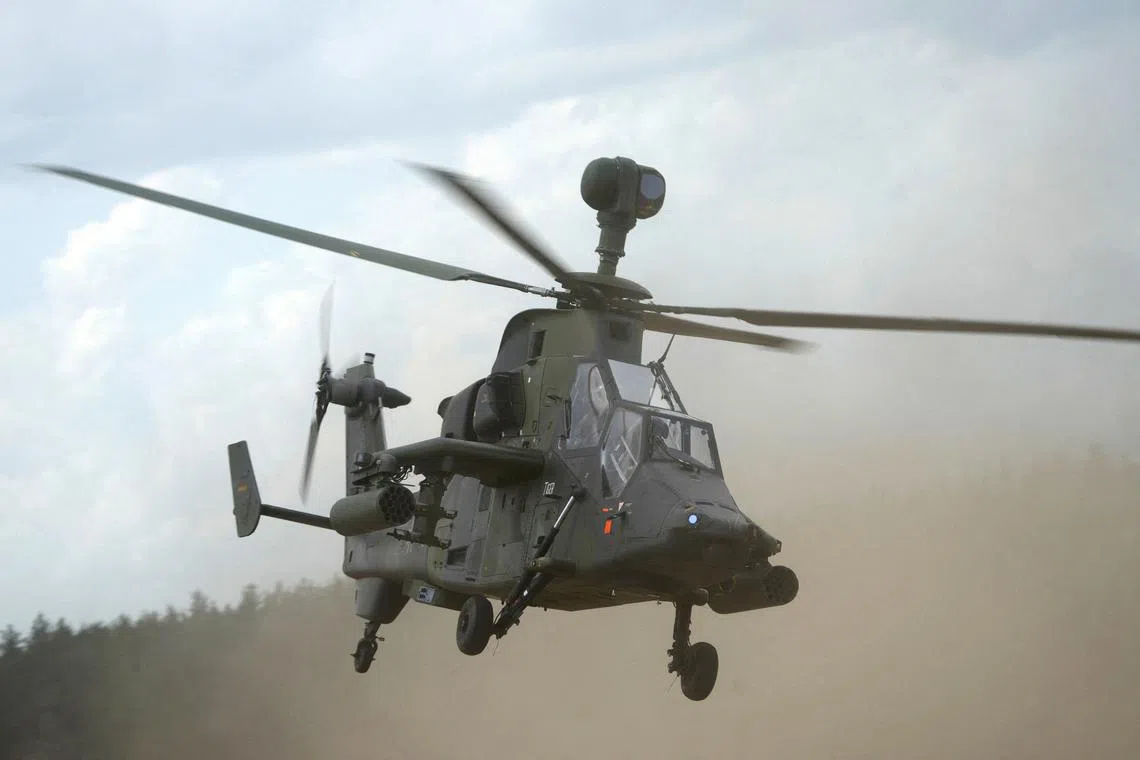 FILE PHOTO: German army Eurocopter Tiger helicopter flies during Quadriga 2024 military exercise in Pabrade, Lithuania May 29, 2024. REUTERS/Ints Kalnins/File Photo