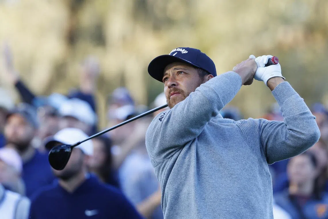 FILE PHOTO: Mar 14, 2025; Ponte Vedra Beach, Florida, USA; Xander Schauffele hits off of the tenth tee during the second round of The Players Championship golf tournament at TPC Sawgrass. Mandatory Credit: Jeff Swinger-Imagn Images/File Photo
