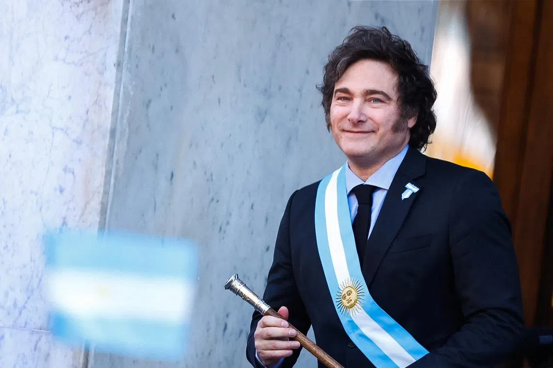 FILE PHOTO: Argentina's President Javier Milei takes the stage outside the Cabildo during the commemoration of the 214th anniversary of the May Revolution, in Cordoba, Argentina May 25, 2024. REUTERS/Leandro Bustamante Gomez/File Photo