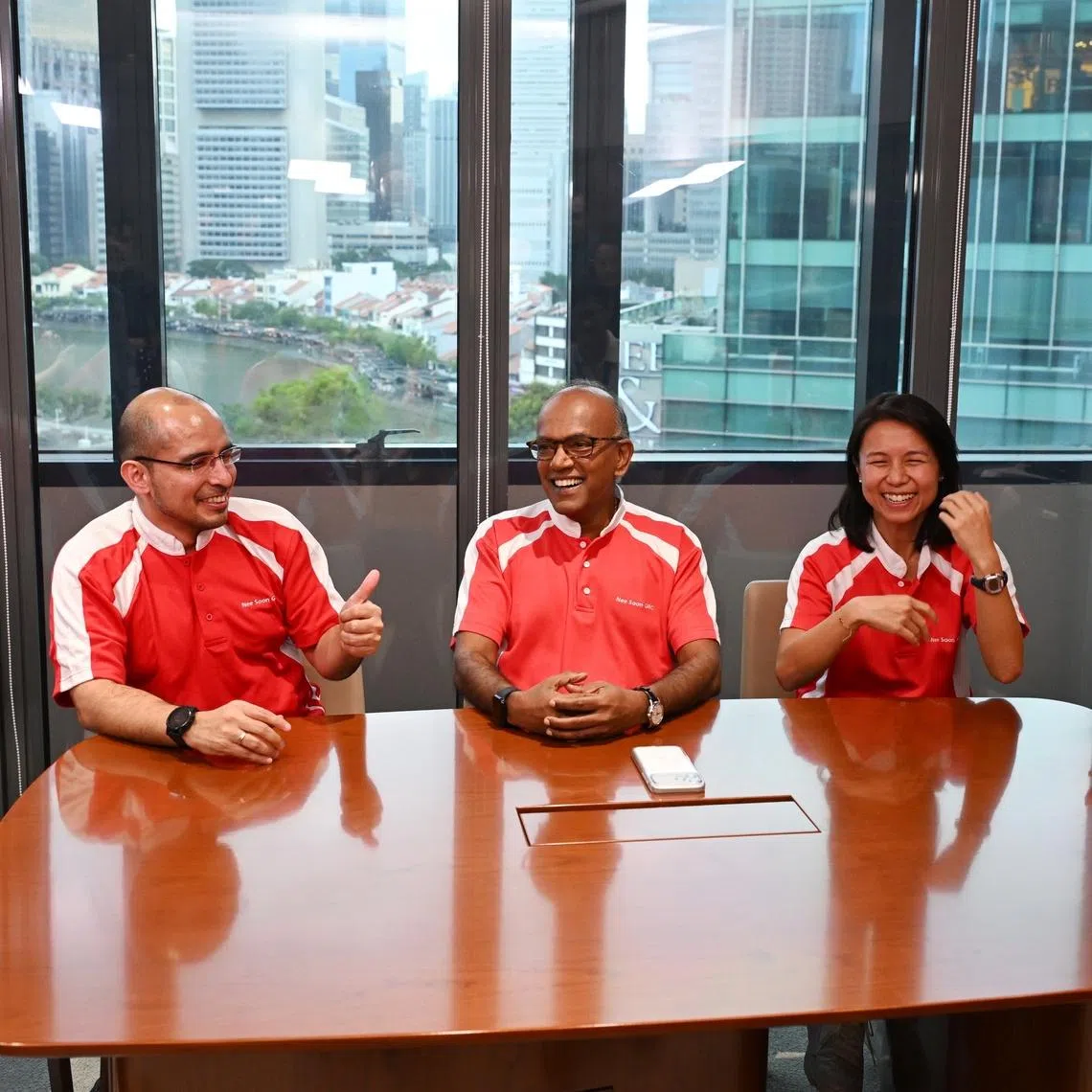 Coordinating Minister for National Security K. Shanmugam (centre) and fellow Nee Soon GRC MPs (from left) Jackson Lam, Syed Harun Alhabsyi, Goh Hanyan, and Lee Hui Ying speaking to ST on May 7.