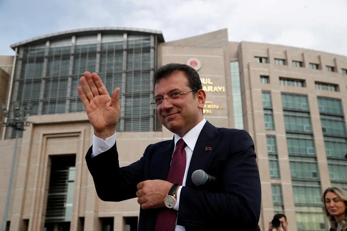FILE PHOTO: Istanbul Mayor Ekrem Imamoglu, re-elected on Sunday, greets his supporters after receiving mayoral certificate in front of the Caglayan Courthouse in Istanbul, Turkey April 3, 2024. REUTERS/Dilara Senkaya/ File Photo