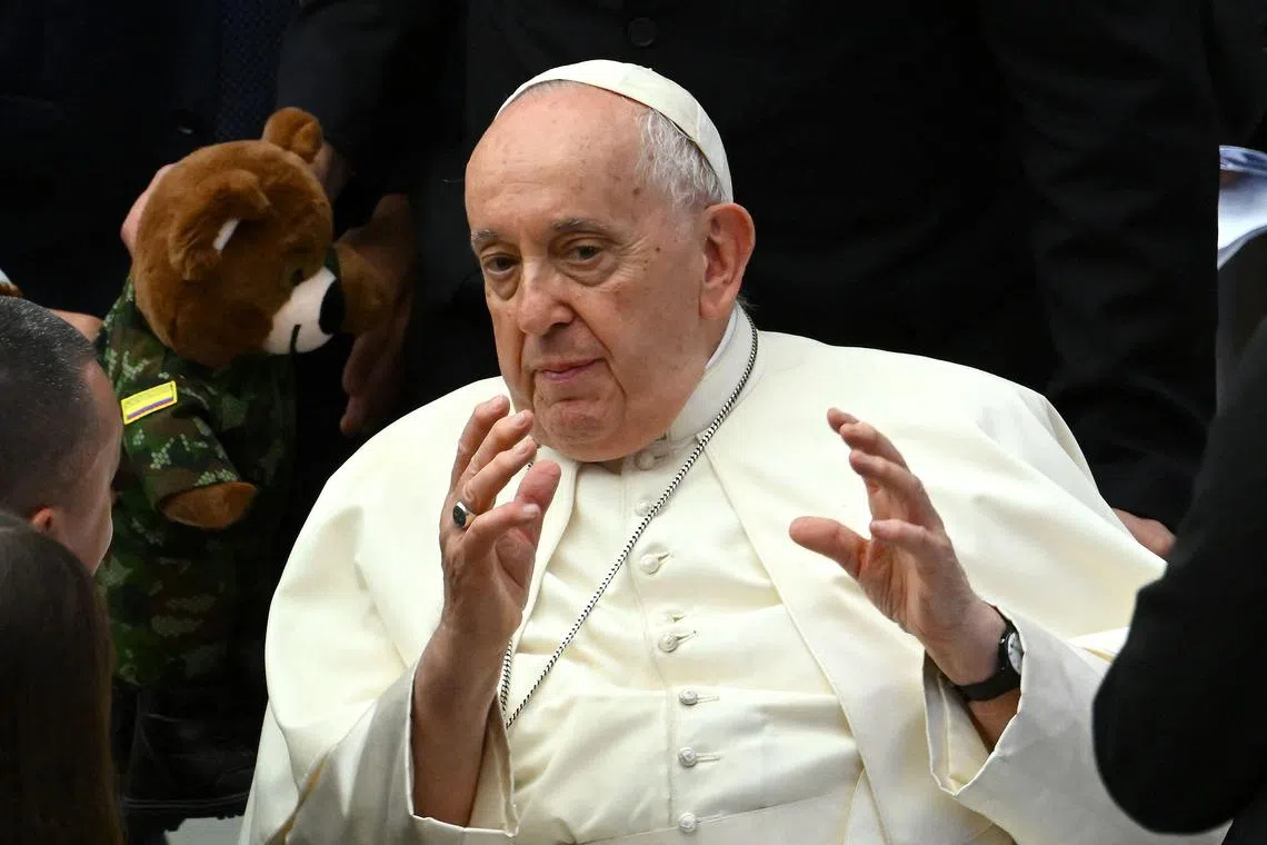 Pope Francis l talks to pilgrims during his weekly general audience in Paul VI hall at the Vatican on August 30, 2023. (Photo by Filippo MONTEFORTE / AFP)