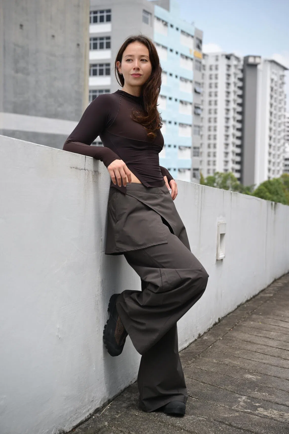 Annelieke Dompeling wearing the Mora Active Top and Neo Skort Pants from The Crossing Collection, launching in September.