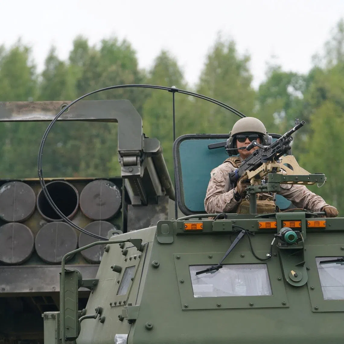 A U.S. soldier on task with a High Mobility Artillery Rocket System (HIMARS) during a live fire exercise with Lithuanian and U.S. troops at the annual naval military drills \"Baltops\" in Klaipeda, Lithuania, June 5, 2025. REUTERS/Janis Laizans