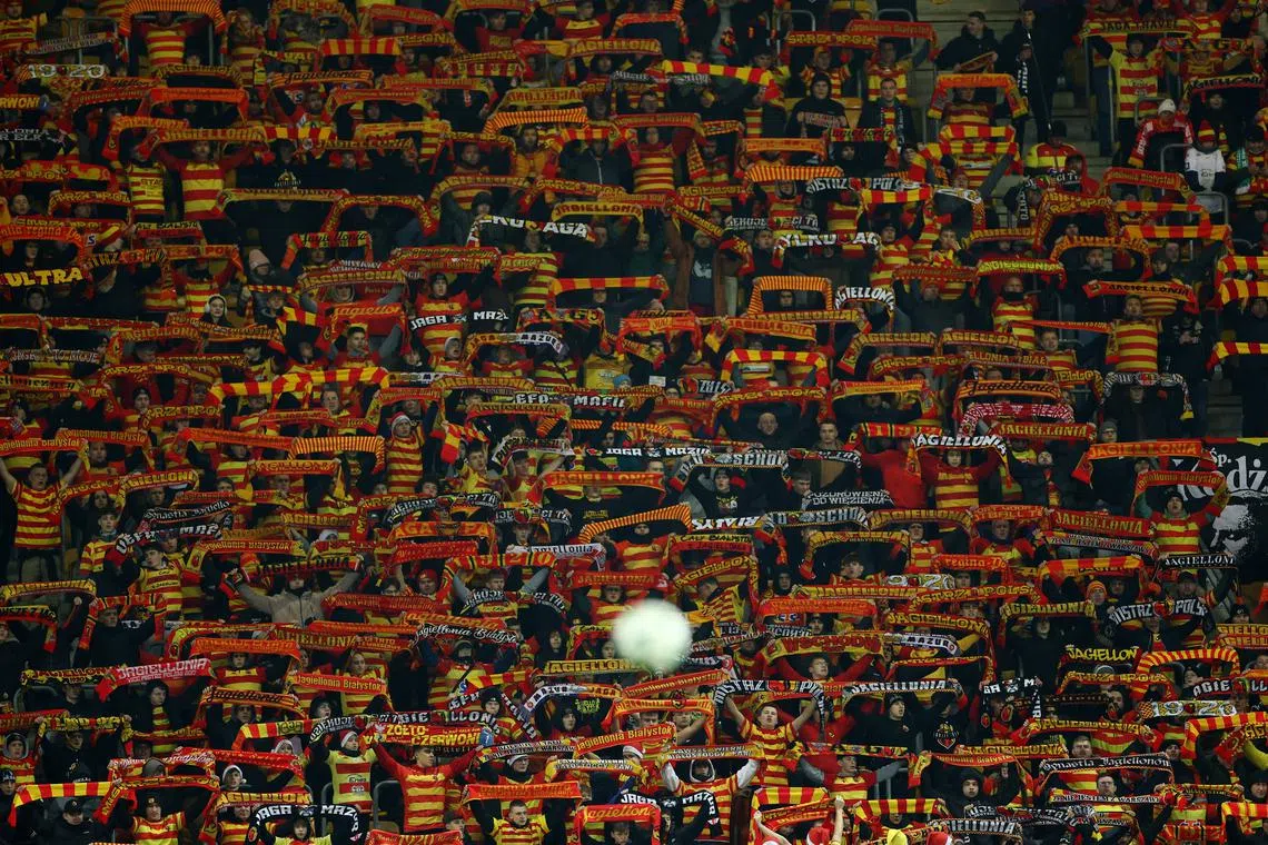 Soccer Football - Conference League - Jagiellonia Bialystok v Olimpija - Bialystok City Stadium, Bialystok, Poland - December 19, 2024 Jagiellonia Bialystok fans in the stands REUTERS/Kacper Pempel