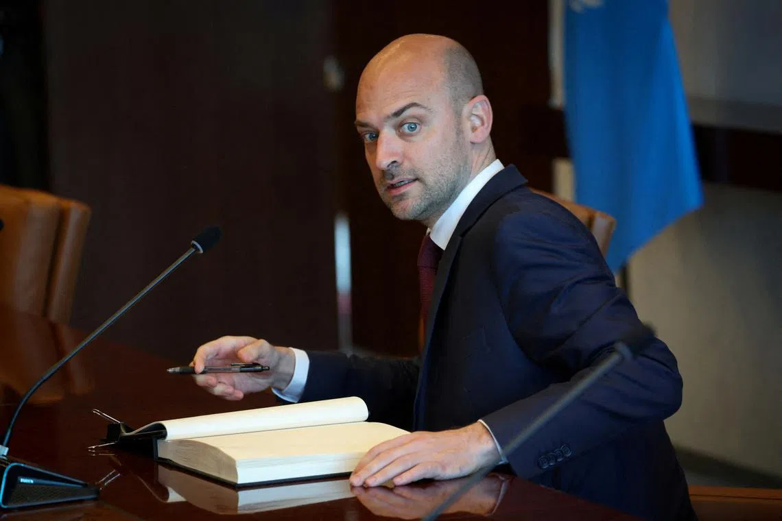 FILE PHOTO: France's Minister for Europe and Foreign Affairs Jean-Noel Barrot signs the guest book upon his meeting with United Nations Secretary General Antonio Guterres at U.N. Headquarters in New York City, U.S., April 29, 2025. REUTERS/Mike Segar