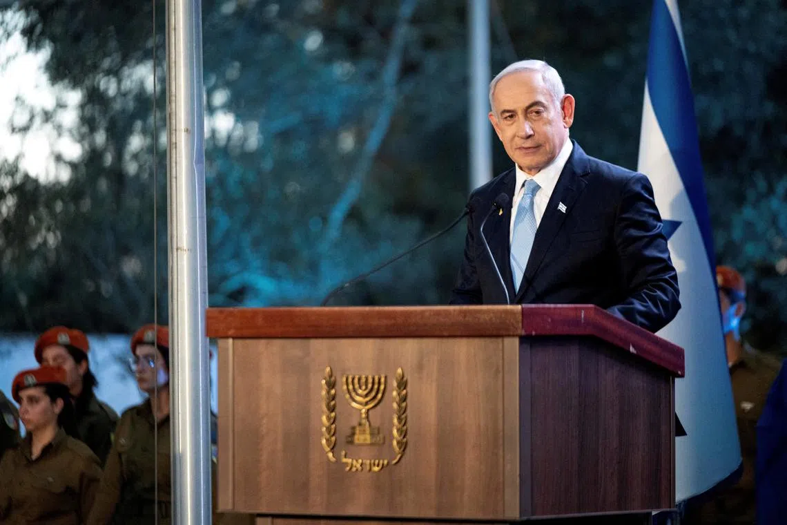FILE PHOTO: Israeli Prime Minister Benjamin Netanyahu speaks at a state memorial ceremony for Zeev Jabotinsky, founder of the Revisionist Zionist movement, amid the ongoing Israel-Hamas conflict at Mount Herzl military cemetery in Jerusalem, August 4, 2024. Naama Grynbaum/Pool via REUTERS/File Photo