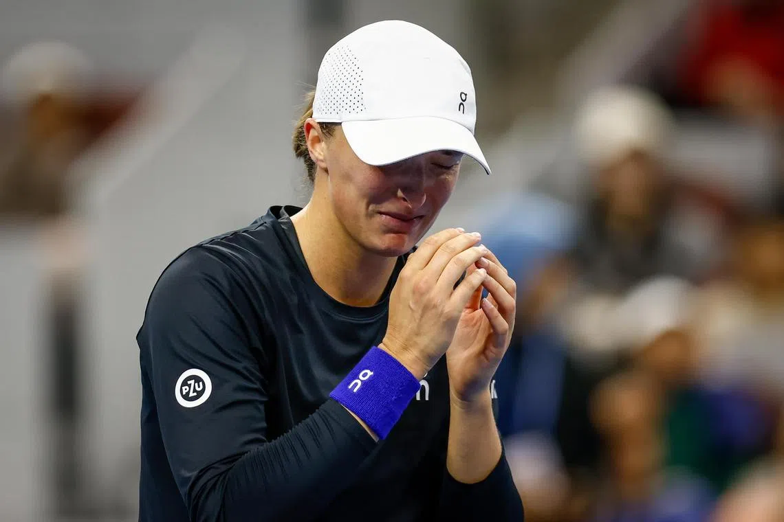 Iga Swiatek of Poland reacting after winning the China Open final against Liudmila Samsonova of Russia 6-2, 6-2 in Beijing on Sunday.