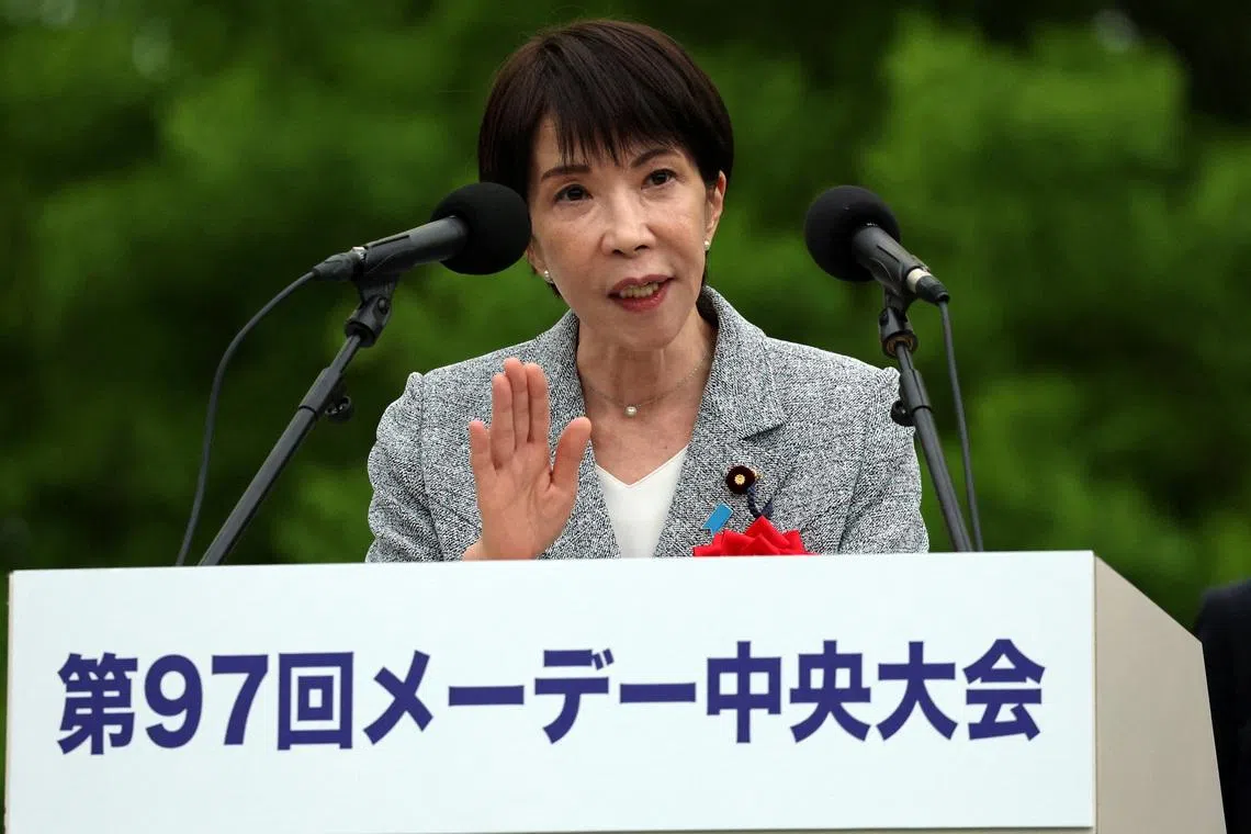 Japan PM vows all-out efforts towards sustained pay hikes at May Day event