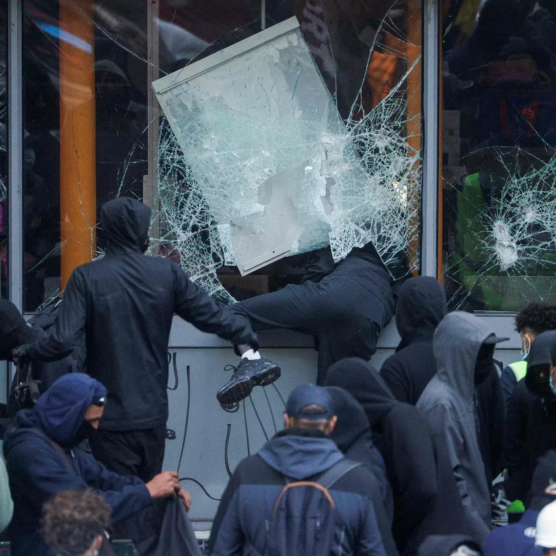 Protesters break windows of a French food company 'Picard' shop during a demonstration in Paris on Oct 17, 2026.