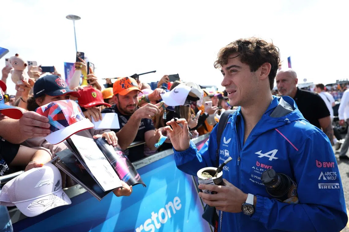 Formula One F1 - British Grand Prix - Silverstone Circuit, Silverstone, Britain - July 3, 2026 Alpine's Franco Colapinto signs autographs for fans ahead of practice REUTERS/Suzanne Plunkett