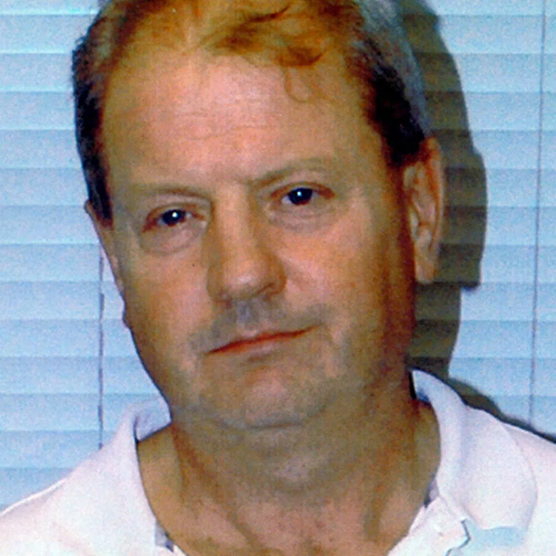 FILE PHOTO: Steve Wright, who has been found guilty of murder, is seen in this undated handout file photograph released by Suffolk Police January 14, 2008. Wright, a married British man who murdered five young women in 2006, was sentenced on February 22, 2008 to life in jail without the chance of remission. Suffolk Police/Handout via REUTERS/File Photo