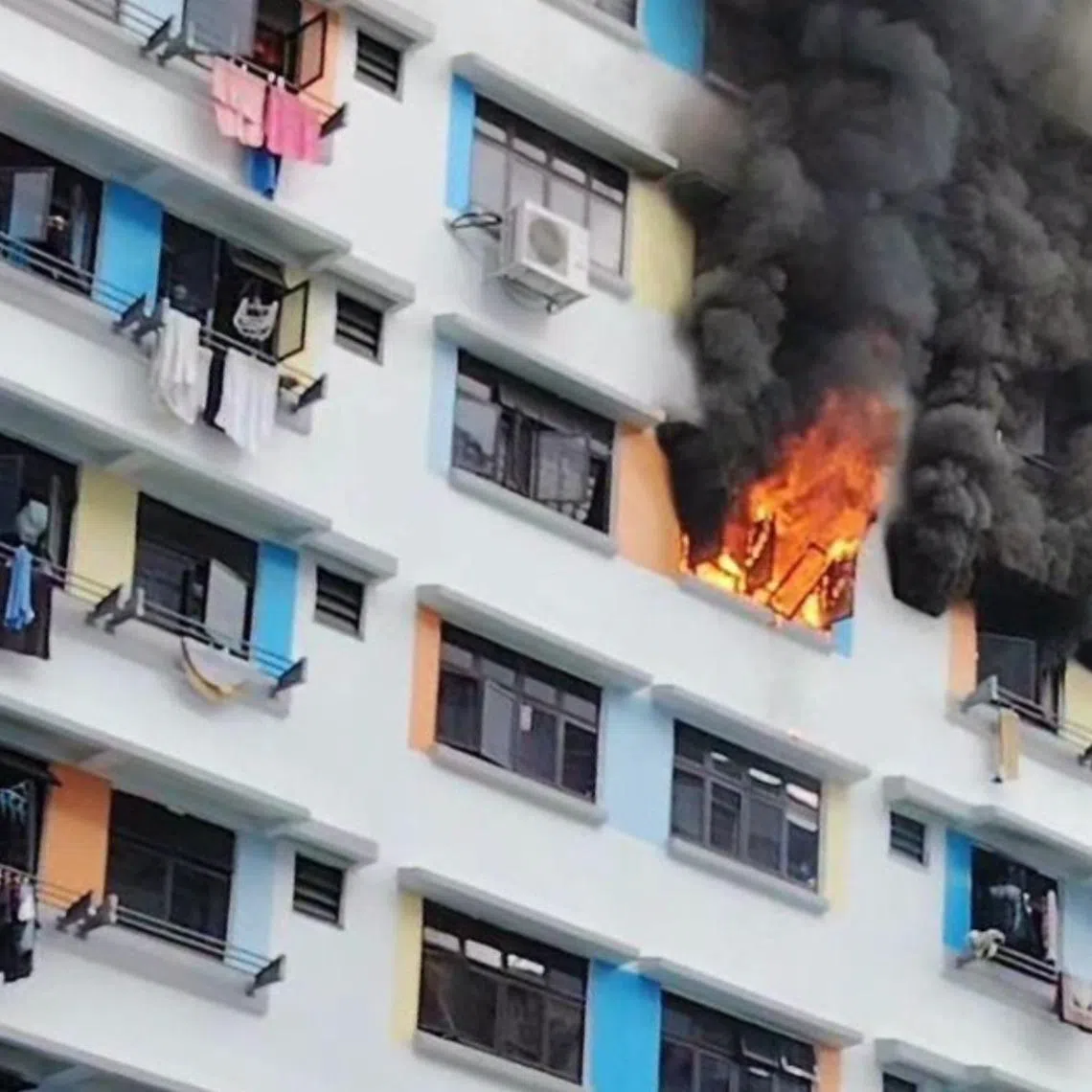 In photos of the incident uploaded to Facebook, thick black plumes of smoke are seen billowing from the windows of the flat.