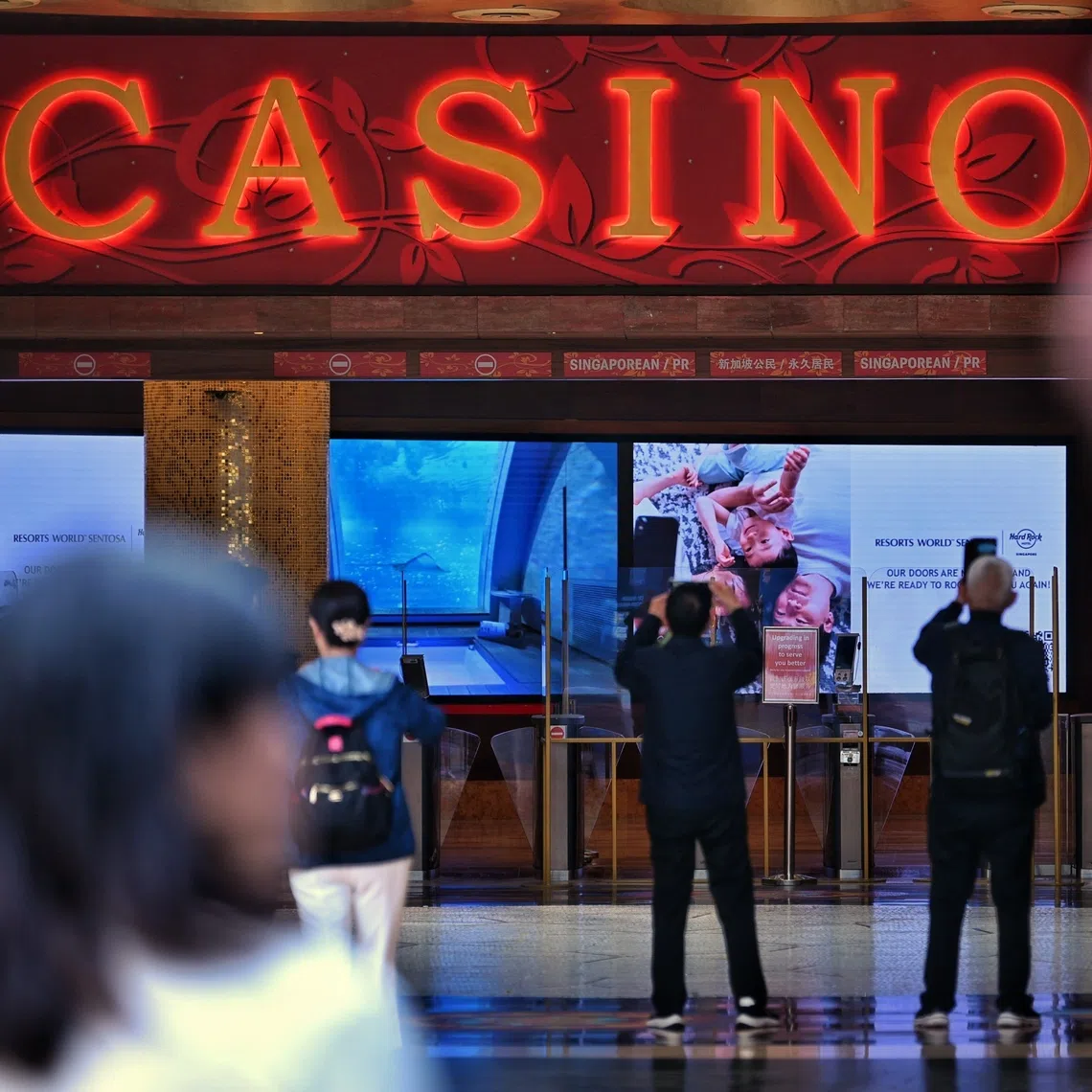 A total of 34 counterfeit S$10,000 notes were allegedly used by the businessman over three visits to the casino in June.