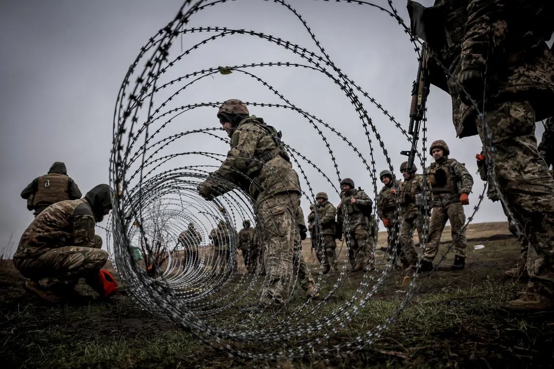 Service members of the 24th Separate Mechanized Brigade named after King Danylo attend military exercises, amid Russia's attack on Ukraine, at a training ground in Donetsk region, Ukraine November 6, 2024. Oleg Petrasiuk/Press Service of the 24th King Danylo Separate Mechanized Brigade of the Ukrainian Armed Forces/Handout via REUTERS/File Photo
