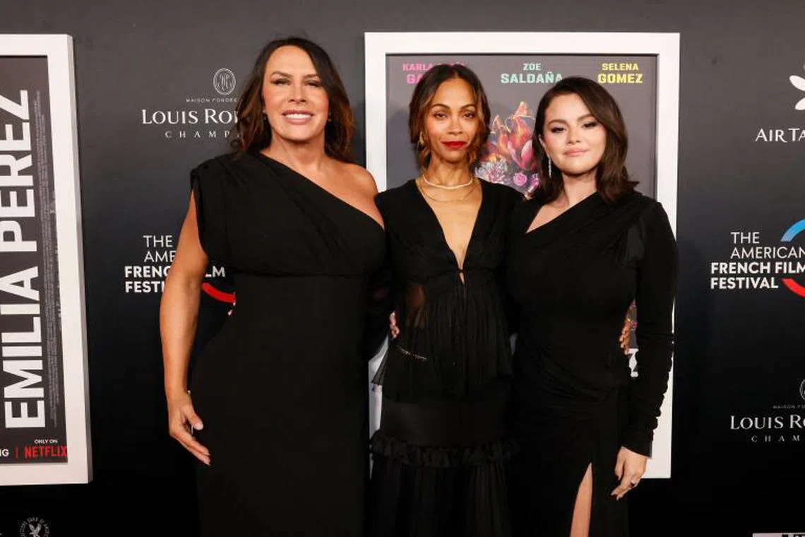 Stars of Emilia Perez (from left) Karla Sofia Gascon, Zoe Saldana, Selena Gomez attend a screening of the musical crime film in Los Angeles on Oct 29, 2024. All three have been nominated for acting awards at the upcoming BAFTAs.