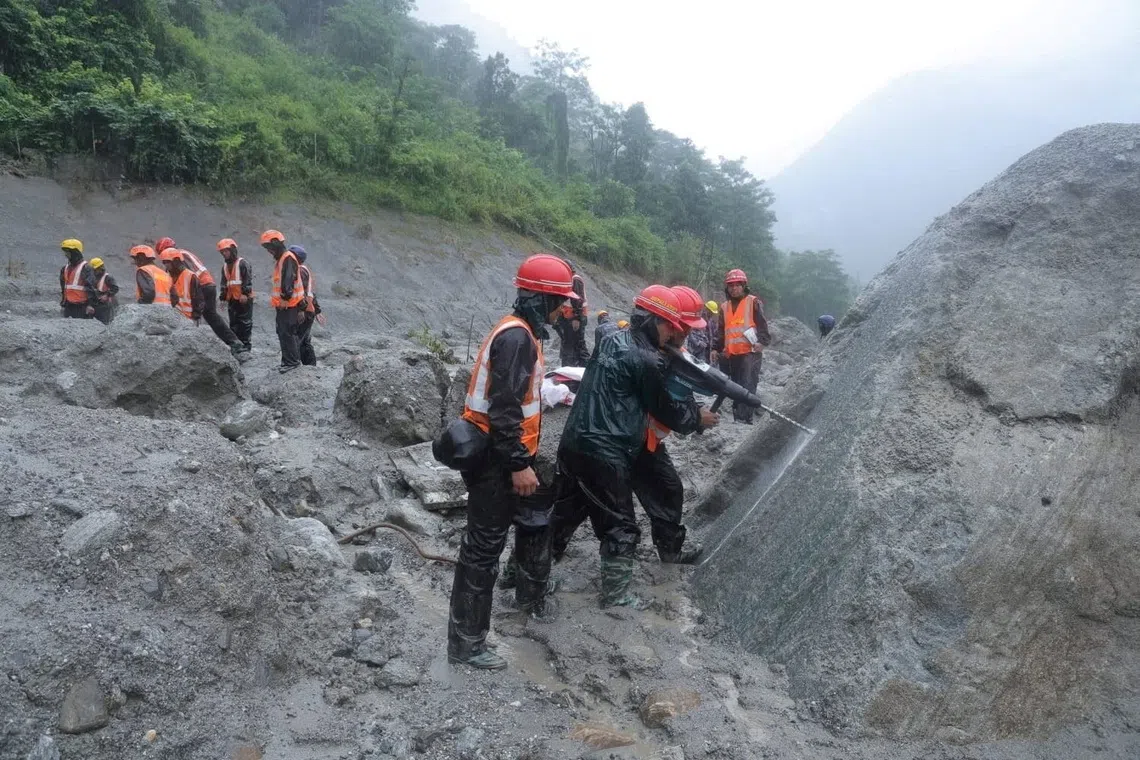 Nepal steps up rescue effort to reach hundreds trapped in tunnels