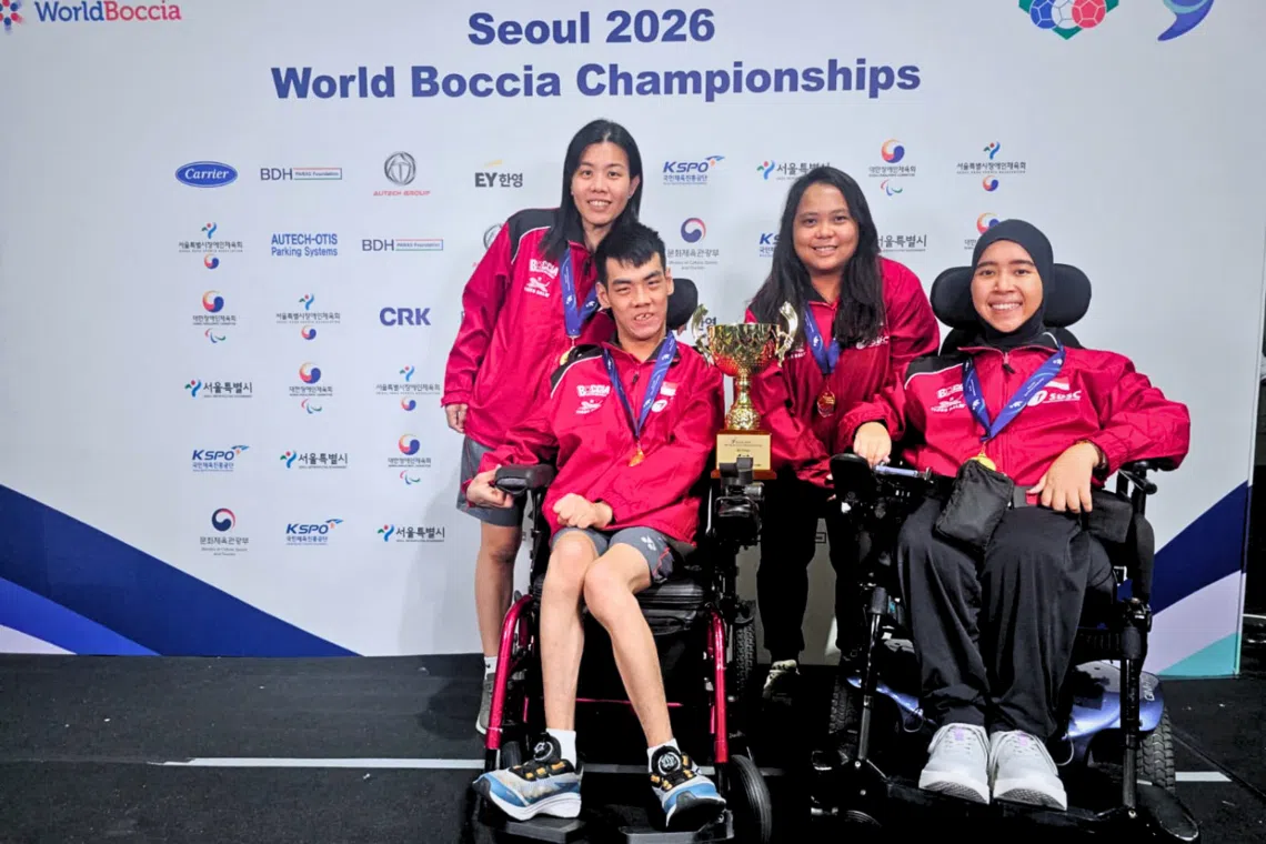 Aloysius Gan (second from left) and Nurulasyiqah Mohammad Taha (far right) made history by winning Singapore’s first gold at the Boccia World Championships.