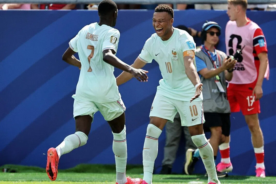 Kylian Mbappe (second from left) and team-mate Ousmane Dembele have four goals each for France at the 2026 World Cup.