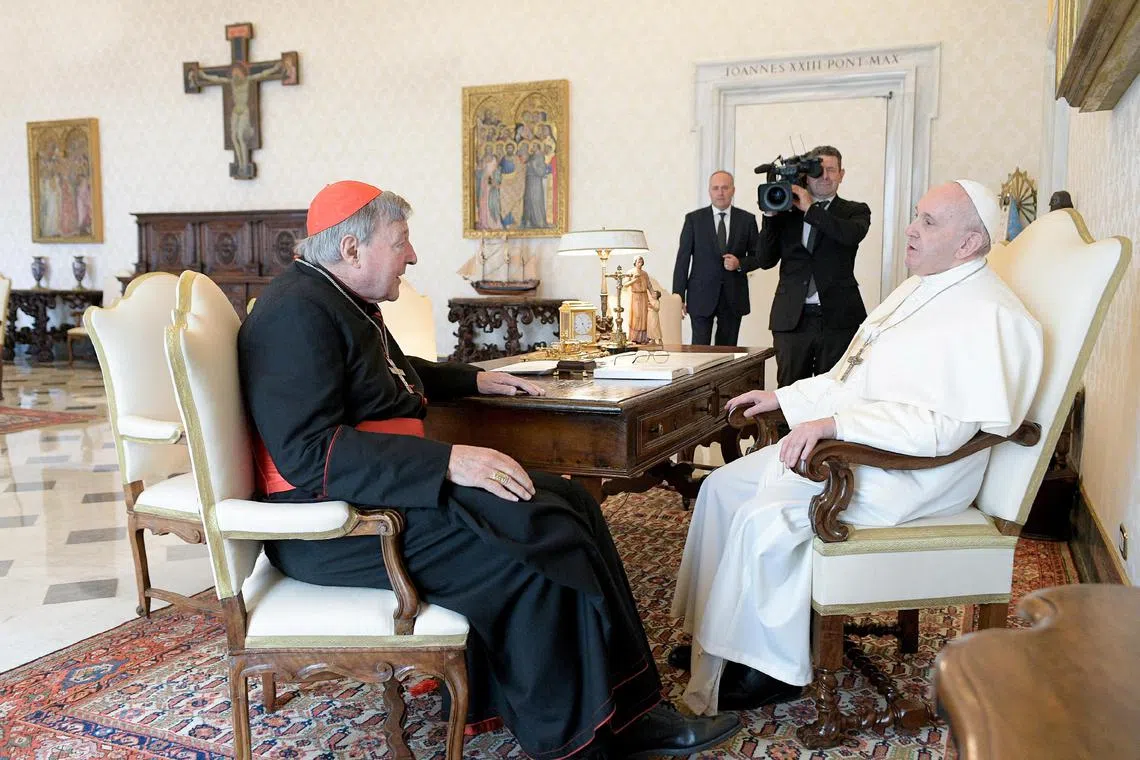 Cardinal George Pell attends a private audience with Pope Francis in this Oct 12, 2020 file photo.