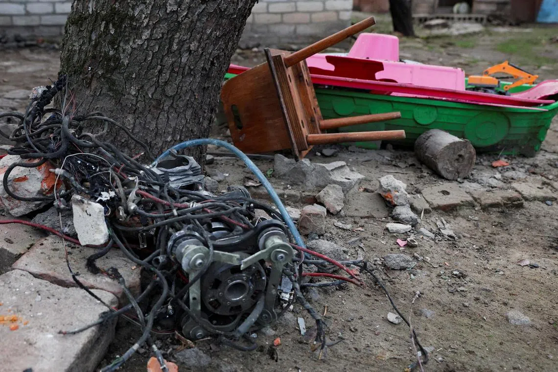 The remains of a Russian attack drone in the garden of a house in Kharkiv, Ukraine, on March 27.